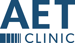aet clinic logo in dark blue font