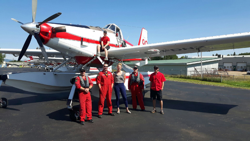 Sydney Chapman of Camosun Innovates with a firefighting crew from Conair Aviation