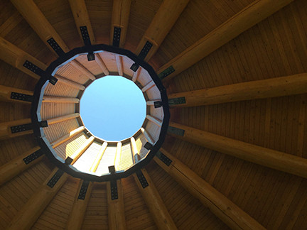 Photo of the oculus of Na'tsa'maht and blue sky