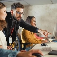 Instructor with computer students