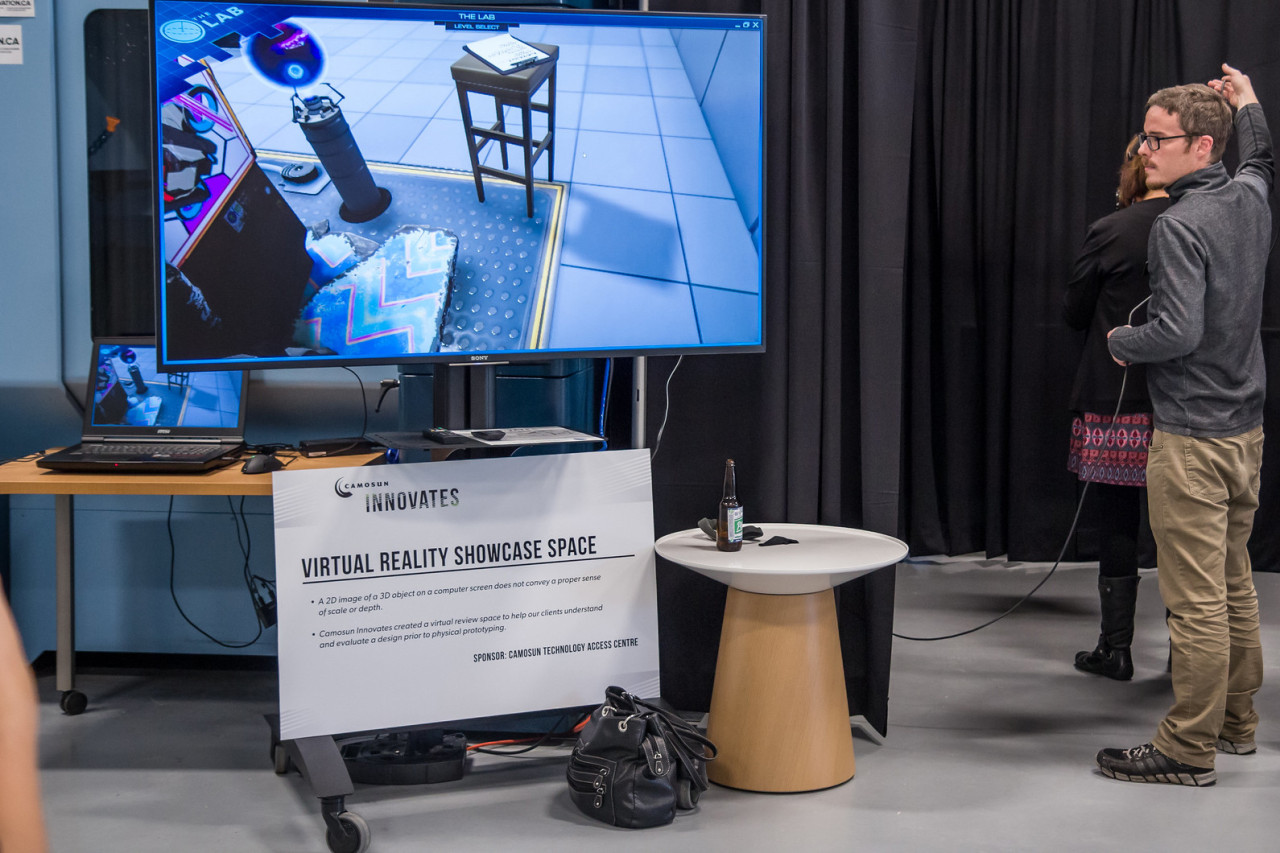 a worker sets up a virtual reality demonstration 