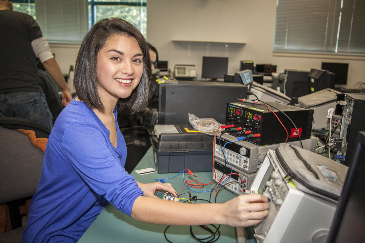 student in electronics lab
