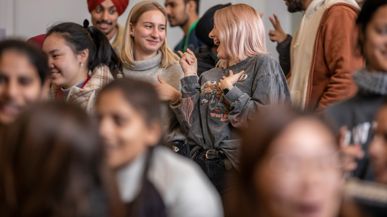 Two students connect during new student orientation