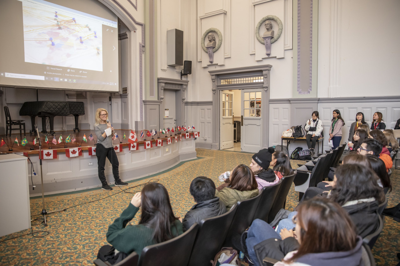 A speech in a theatre during international orientation