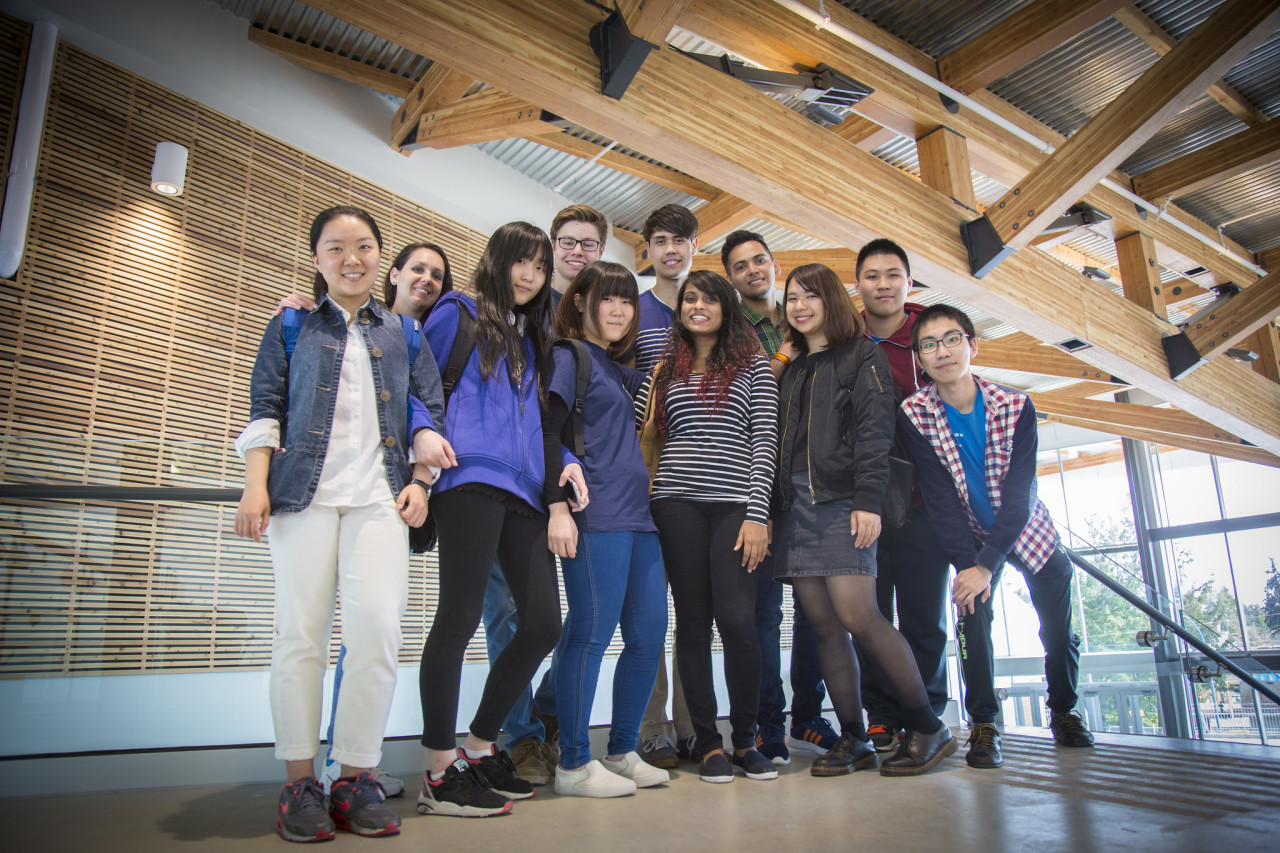 A group of International students waiting to welcome new students.