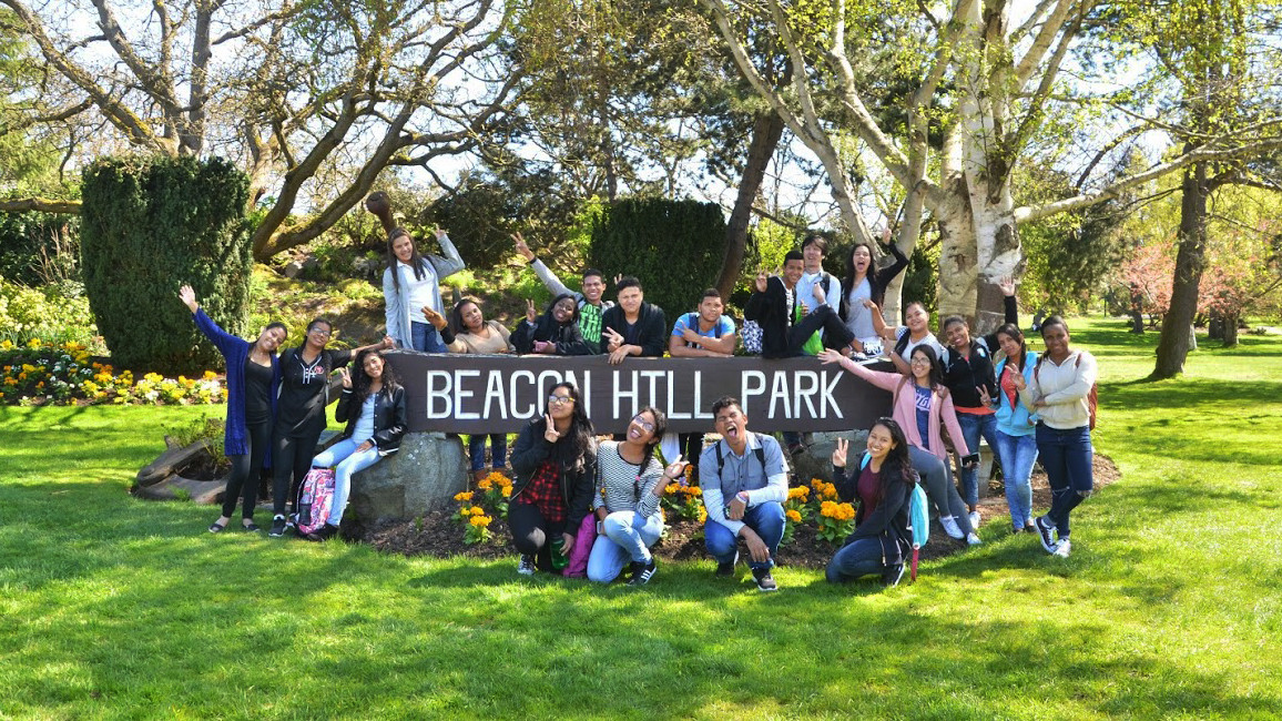 CELA students pose for a group photo in front of the world famous Beacon Hill park sign.