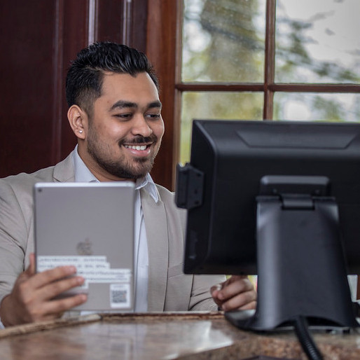 Applied Tourism & Hospitality Management, Post Degree Diploma student Lorenzo Gomes working in the Dunlop House restaurant on campus