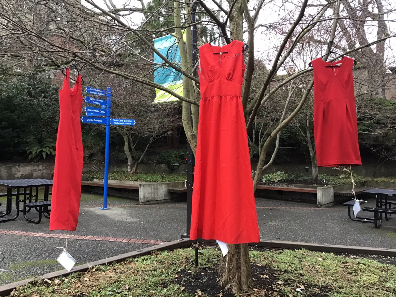 Red dresses display on campus