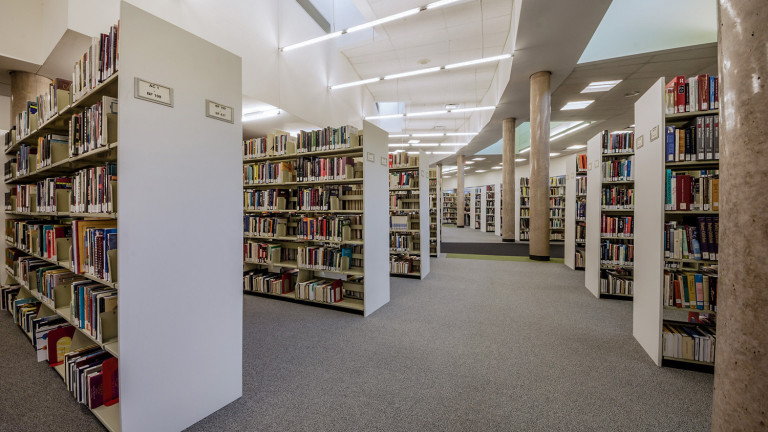 Rows of bookshelves at lansdowne library