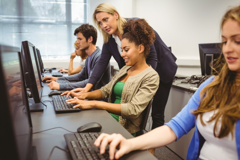 Students sitting in a computer lab