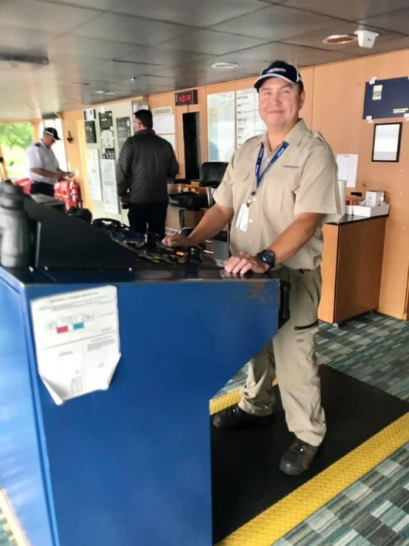 Richard Watts, a recent graduate from the Bridge Watch Rating program, steers the "Adventure" out of dock in Prince Rupert.