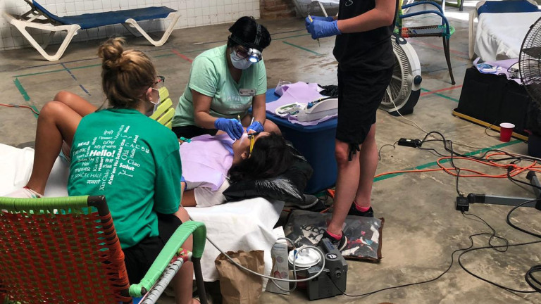 Emma Balneaves treats patients in a dental field school in San Pancho Mexico