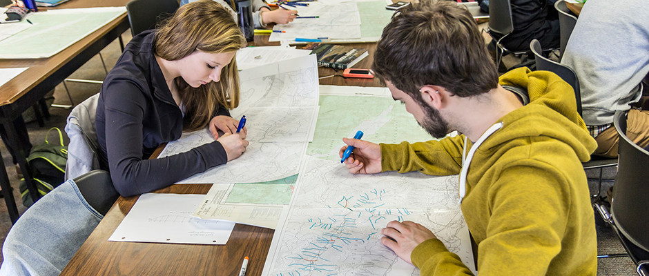 students with maps