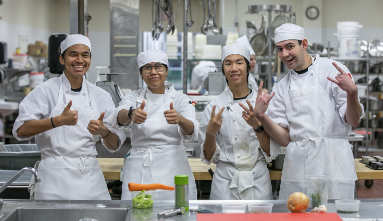 Cooks Training - student group giving thumbs up